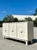 This exquisite vintage credenza serves as a stunning focal point, blending global artisanal craftsmanship with a clean,...