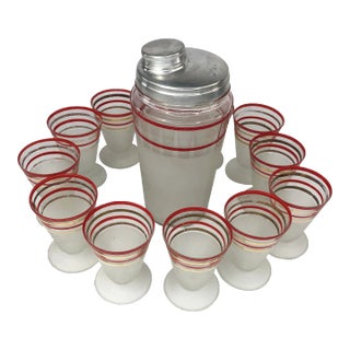 Set of 12 Flared Red and Gold Banded Liqueur Glasses With Cocktail Shaker For Sale