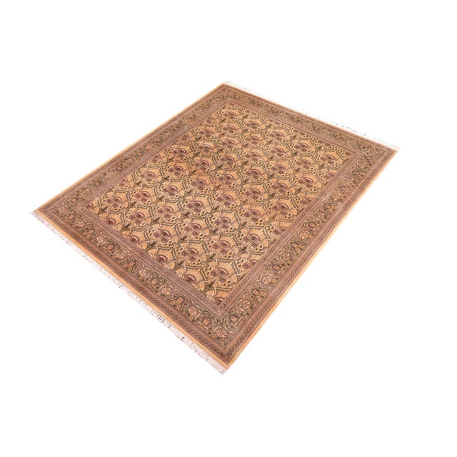 Designed with mesmerizing intricacy and gorgeous color palette, this hand-knotted masterpiece demonstrates the beauty and...