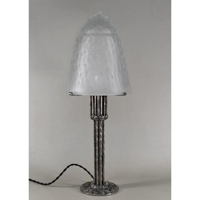 Muller frères A wonderful large French 1930 art deco lamp in wrought iron. The forged base of excellent quality holds a...