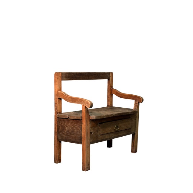 Antique 19th-century bench made of chestnut and cherry wood, with a handy drawer underneath for storing small items. Solid...