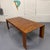The El Dom Rosewood Dining Table is a minimalist modern dining table designed by Hannes Wettstein for Cassina in 2005....