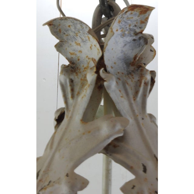 This listing features a selection of enormous white cast iron chandeliers originating from France. This light fixture...