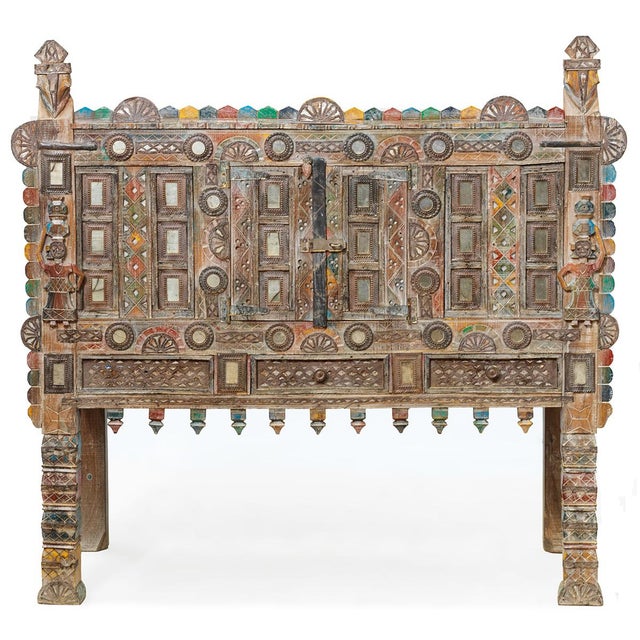 This stunning Damchiya chest originates from Gujarat, India, adorned with elaborate embellishments and motifs. Originally...