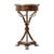 A mahogany side table, the circular brass bound top fitted with a frieze drawer on three bound brass hilted sabres mounted...