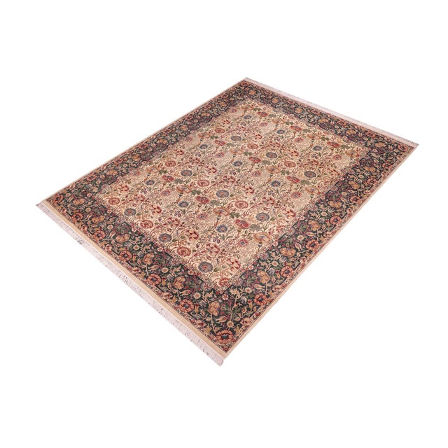Designed with mesmerizing intricacy and gorgeous color palette, this hand-knotted masterpiece demonstrates the beauty and...