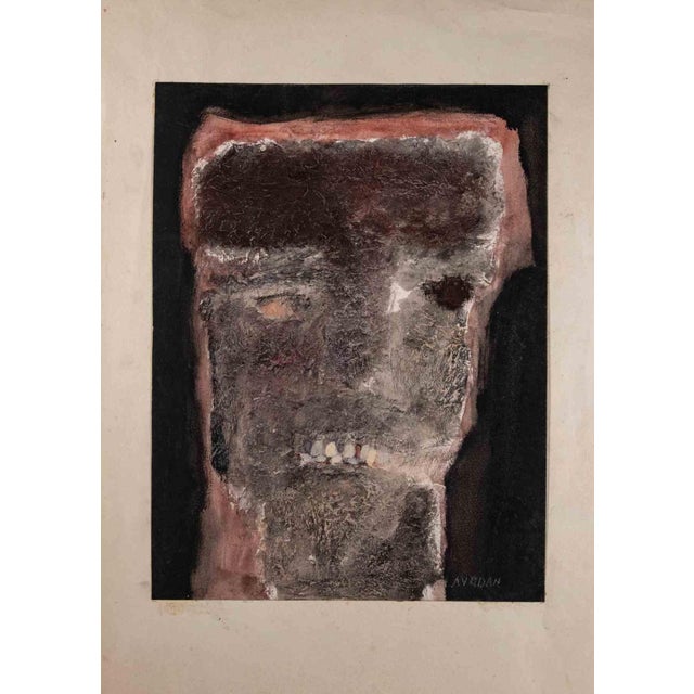 Head is an original artwork realized by Spanish artist Manuel Avedán (1929) Oil and mixed media on cardboard. Hand-signed...