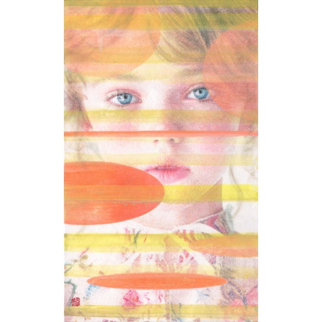 This artwork features a delicate portrait of a young girl, her striking blue eyes captivating the viewer amidst a layered...