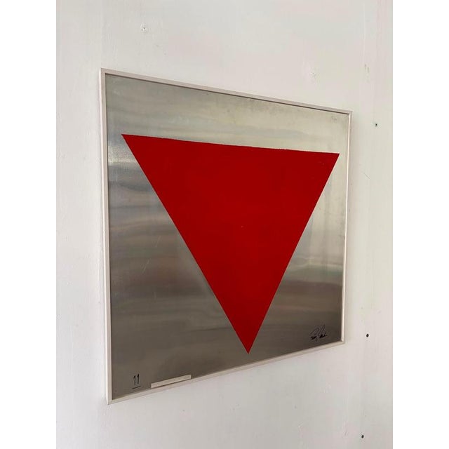 A 1960s artwork featuring a geometric composition painted directly onto a steel sheet—characterized by the clean, rigorous...