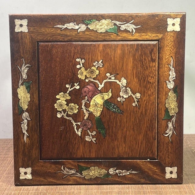 Beautiful square wooden stool crafted from rosewood, decorated with elaborate mother-of-pearl shell inlay on the top...