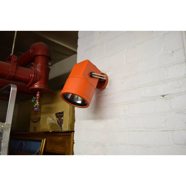 Two vintage "UNISPOT" spot lights made for wall, ceiling or track lighting use. Each light has a hard molded plastic body...