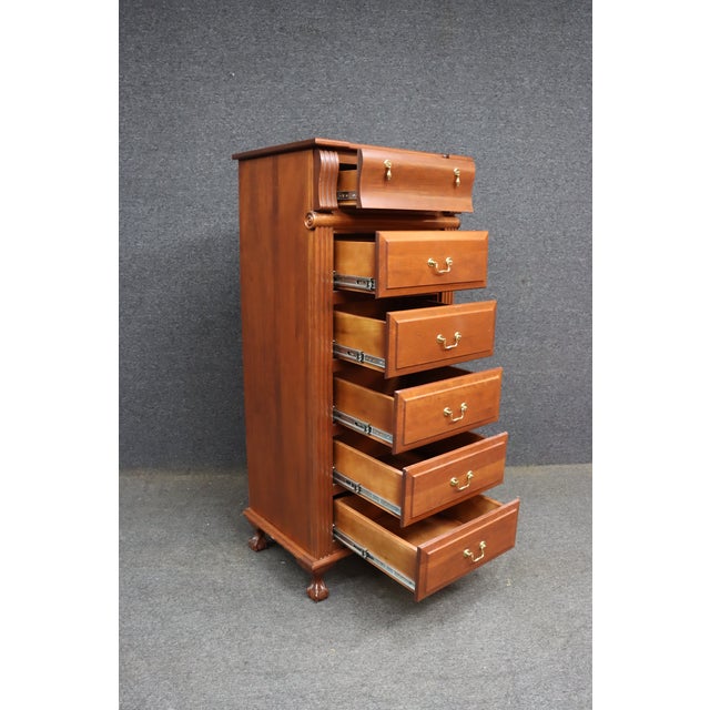 Crafted by Dutch Designs of Ohio, this cherry lingerie chest features a traditional silhouette with fluted pilaster...