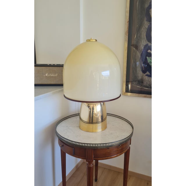 A monumental and highly decorative italian table lamp in the iconic "champignon" mushroom form, a silhouette that became...