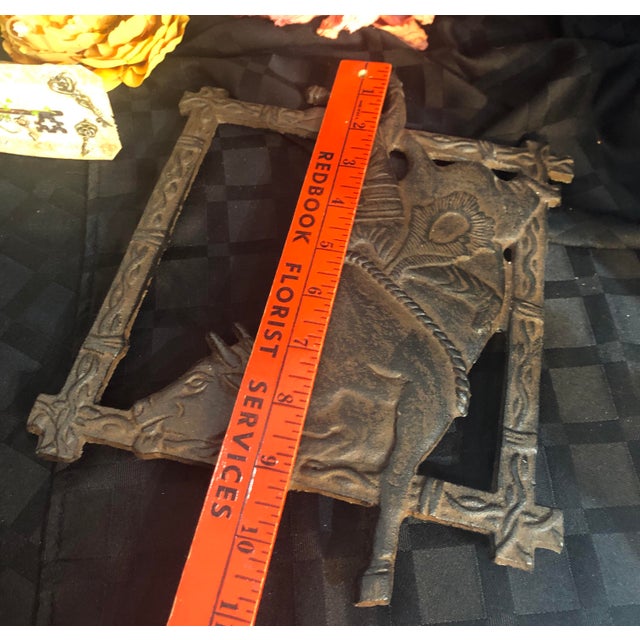 Vintage Cast Iron Vintage Heavy Cowboy Trivet Chairish