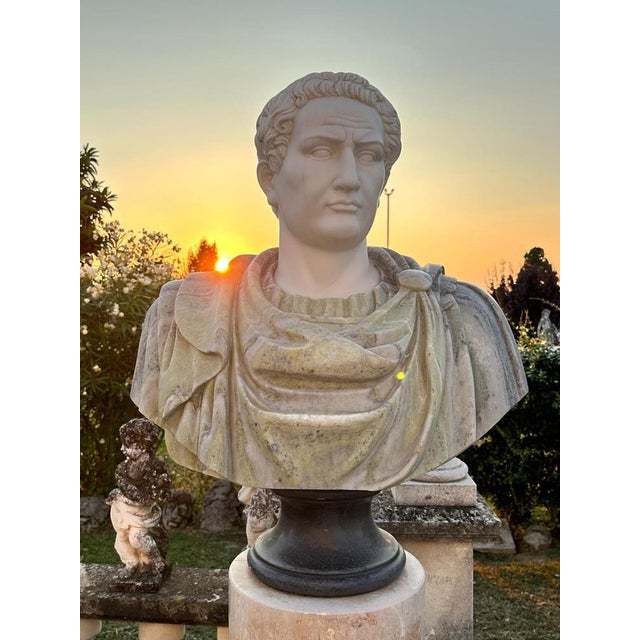 Introducing an impressive Italian Marble Bust of an Emperor, exquisitely carved from colorful marbles sourced from Italian...