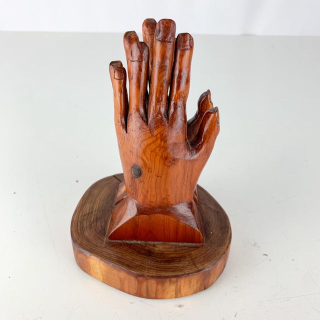 Beautiful vintage hand carved wooden praying hands sculpture on round base. Love the colors and details. Bottom inscribed...