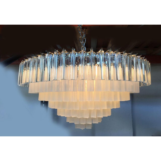 Contemporary triedro Murano glass chandelier transapernt and sanded "triedro". Seven levels of glass very sparkling. spare...