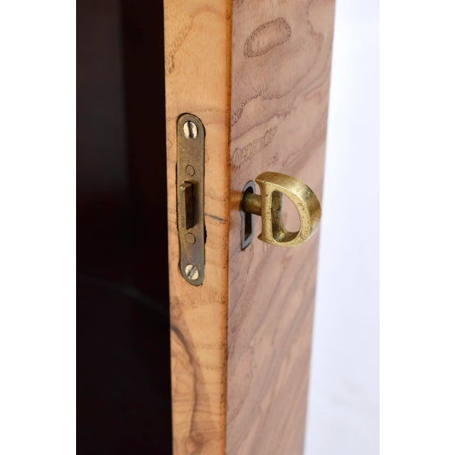 Faceted Pedestal Cabinet/ Dry Bar model 6302D by Edward Wormley for Dunbar, introduced in 1963, in natural olive burl with...