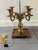 Large and Impressive late 20th century French inspired Bouillotte lamp by Visual Comfort. Features a four arm candelabra...