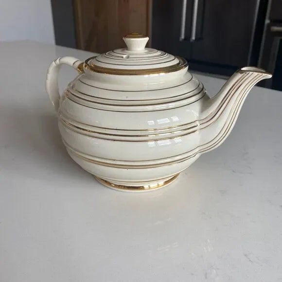 Vintage Sadler Horizontal Gold Ribbed Design in Ivory White 1947 Teapot, 9" W x 5.5 H" (4cups) Brand: Sadler Size: 9" W x...
