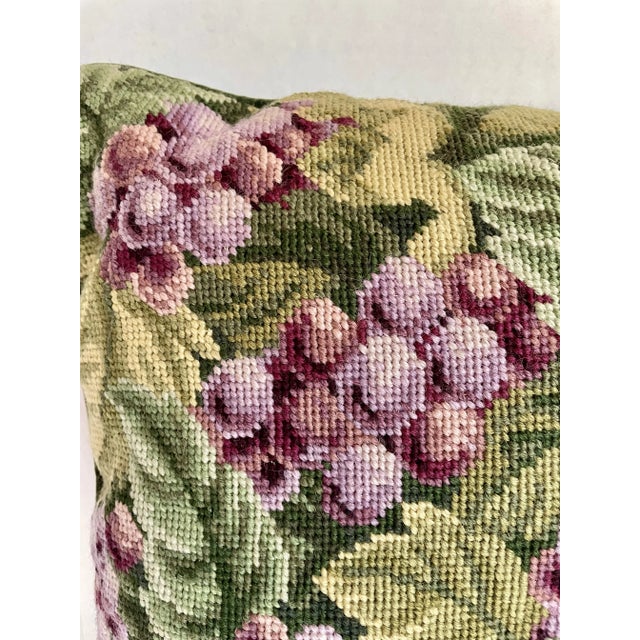 Here is a lovely embroidered needlepoint pillow of a cluster of grapes growing on grapevines. The grapes are a wonderful...