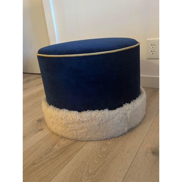 Custom ottoman upholstered in Kravet Chenille & bordered in sheepskin.