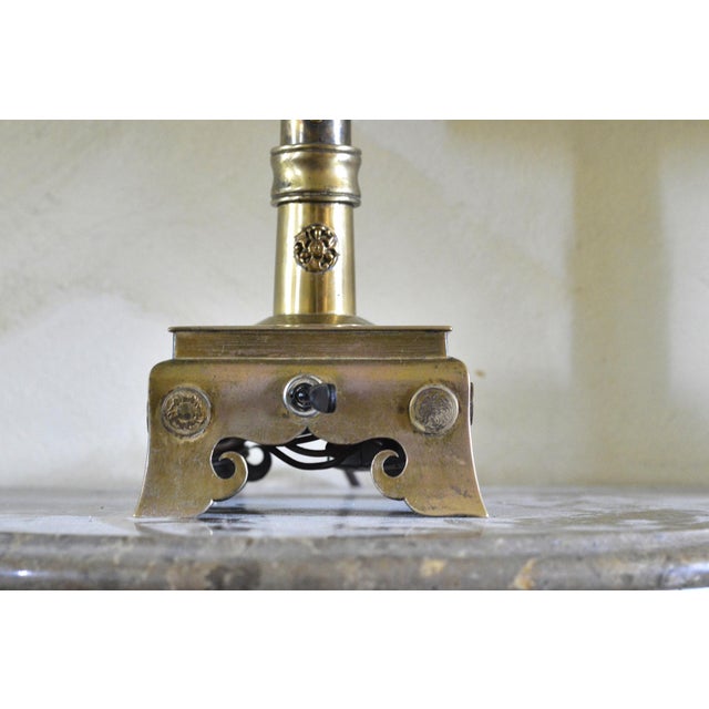 This is a pair of brass lamps from the USA Dated to the 1950s or 1960s They are connected by a 128 cm-long electrical cord...