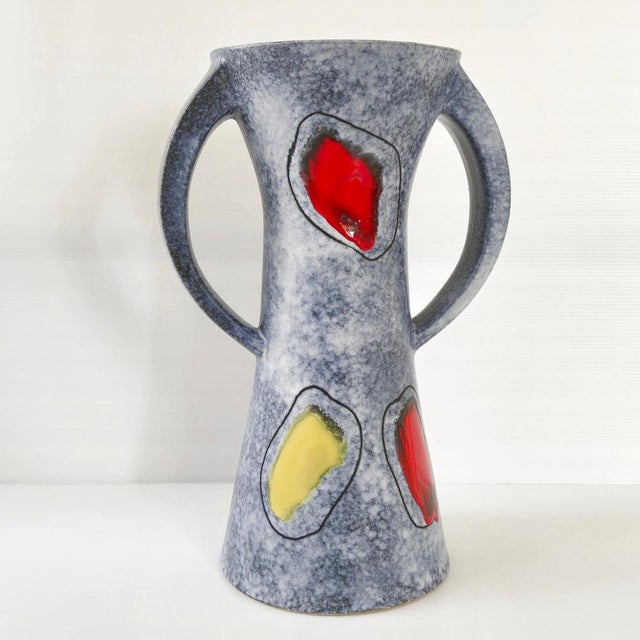 Fair condition. Very minor chips and two small nicks, one of which is not visible at the base, and a small chip on the...