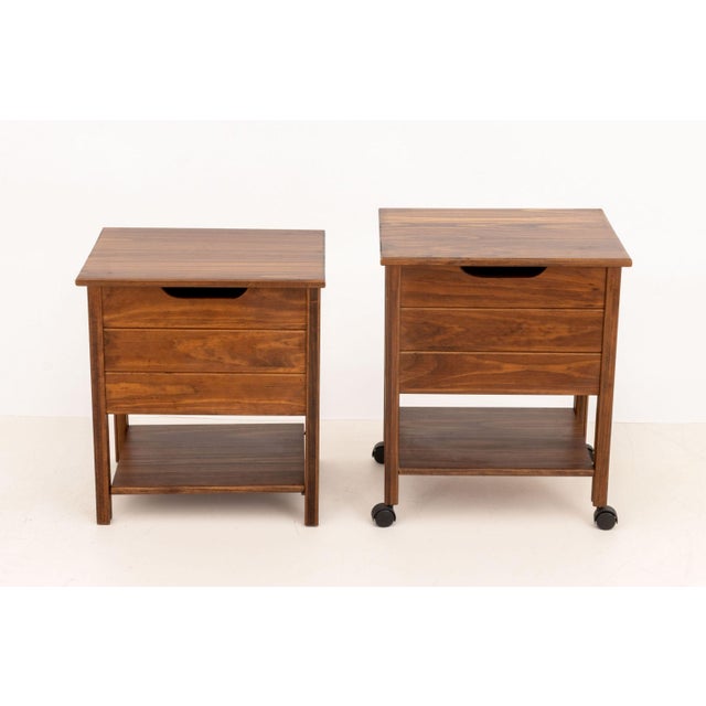 Pair of Modern Teak Lift-Top Liquor Chests, one mounted on casters. 23.5" H x 19.25" W x 16" D. Provenance: From an Upper...