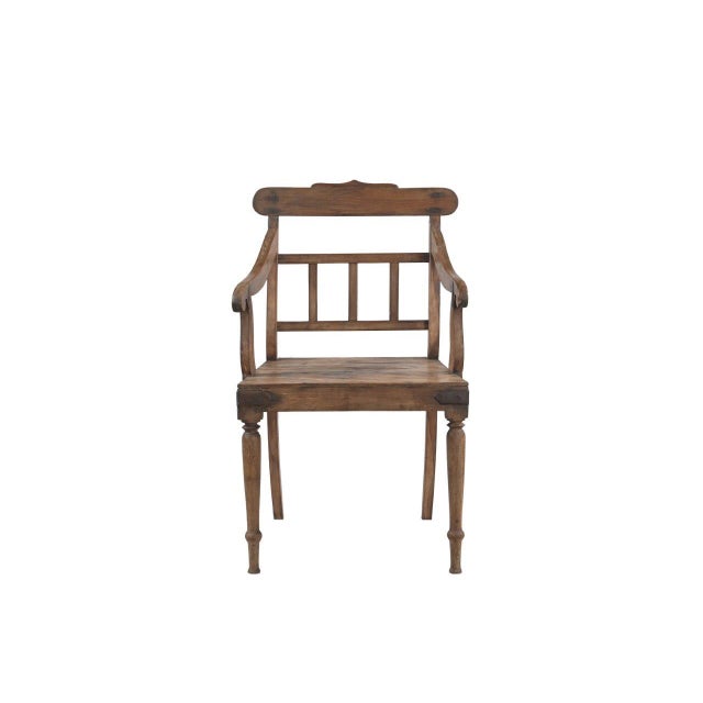 This Vintage Anglo-Indian Teakwood Armchair is handcrafted from solid teakwood, featuring gently curved arms, a slatted...
