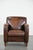 We are offering this beautifully shaped vintage sheepskin armchair with character and beautiful colors. A unique addition...