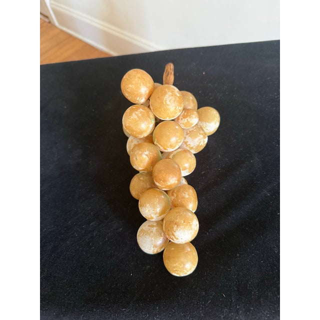 Stunning hand made natural alabaster stone grape cluster with natural grape vine. This beautiful piece It is in very good...