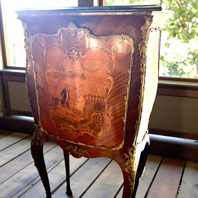 Circa Late 19th Century French Marquetry Vitrine / Tall Chest Cabinet An exquisite French Louis XV–style vitrine cabinet,...