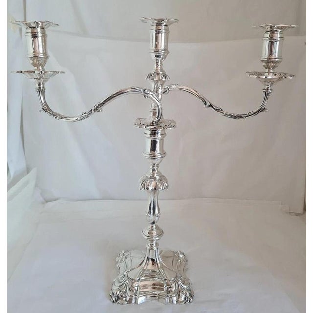 An impressive antique english sterling silver candelabrum by thomas a. Scott, hallmarked in sheffield for 1902. Executed...