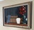 This folk art-style kitchen still life, lathe-art panel portrays cut-out painted wood elements affixed to a dark wood...