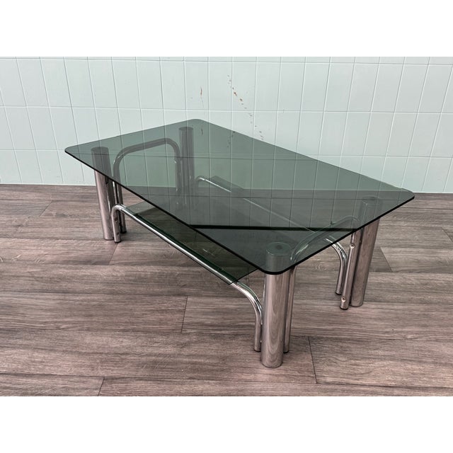 Italian coffee table made in the 1970s. Chromed steel frame. Double smoked glass top.