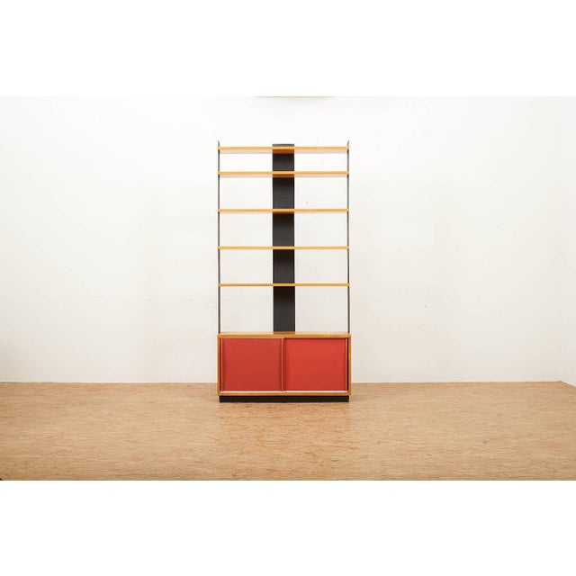 Shelving System Model 132, Birch Veneered Box, Red Pavatex Sliding Doors, Birchwood Shelves, Black Lacquered Sheet Steel....