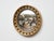 An English Regency giltwood convex mirror from the early 19th century, notable for its classic circular form and bold...