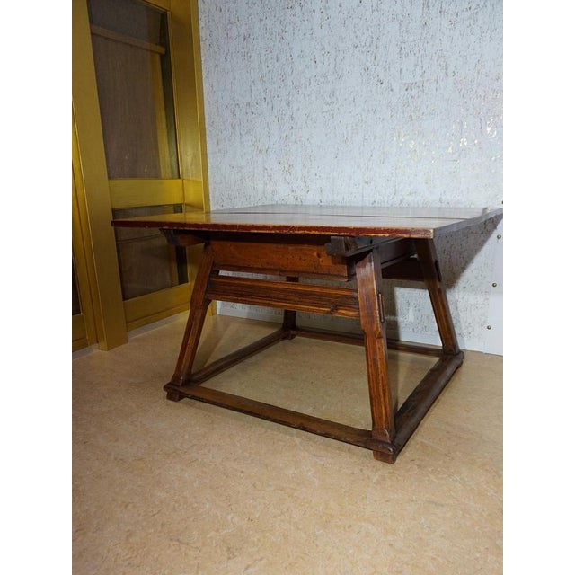 This beautiful large, almost square bankers table or merchants table can be perfectly used as a dining table or a front...