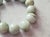 Fabulous Jade bracelet! The bracelet is 9 inches long (22.8 cm) and weighs 115 grams (4 oz). The smooth round beads are...