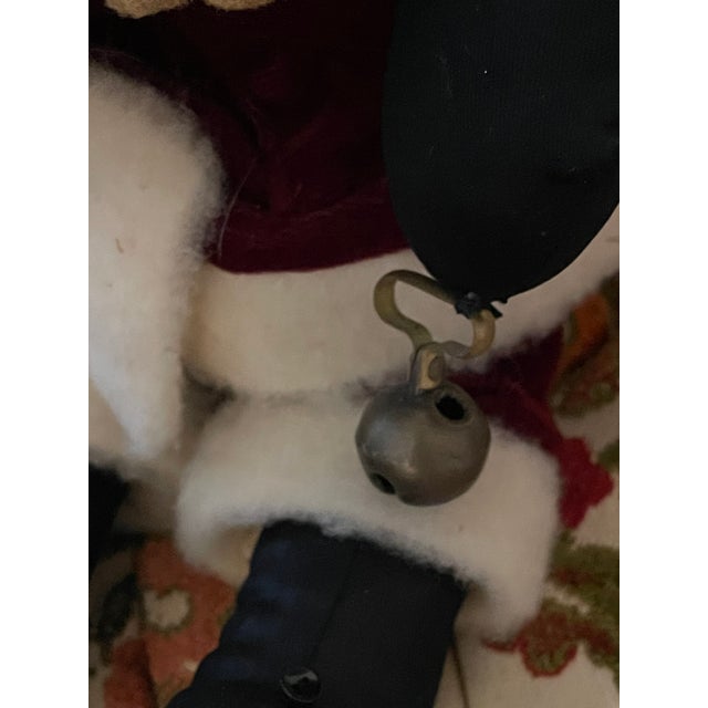 Vintage textile Santa Claus Handmade ceramic face, with gingle bell.