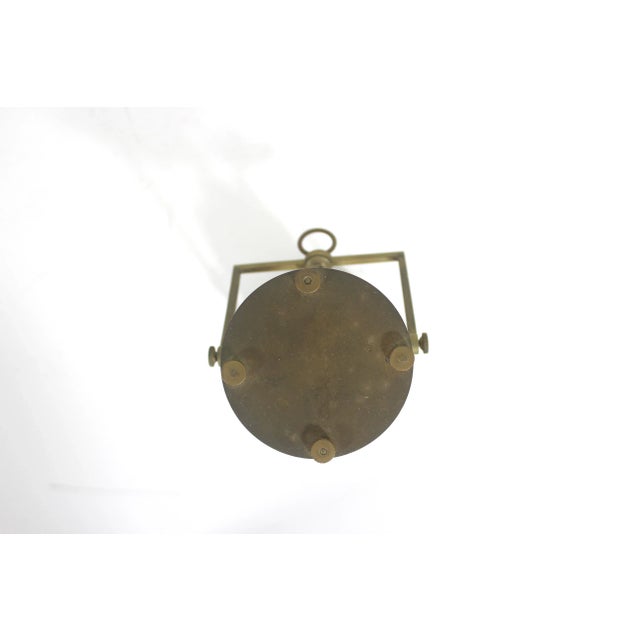 Width: 4 inches Height: 7 inches Great, old brass and glass hourglass or egg timer. Although the sand moves, I cannot...