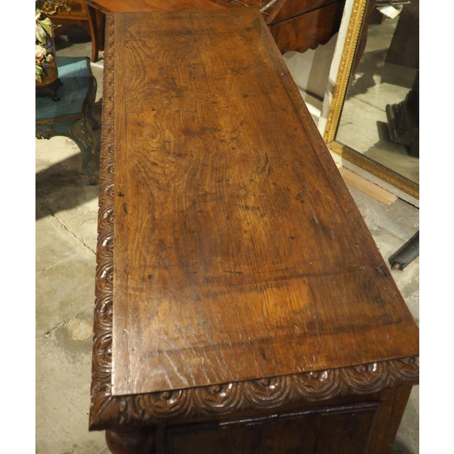 From the 1700’s, this unusual French hunt buffet has expertly carved paneled doors portraying a game bird and a fish. The...