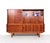 Vintage buffet cabinet produced in the Netherlands in the 1960s. This tall buffet cabinet features a sleek design and is...