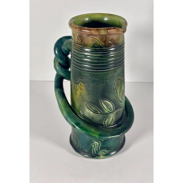 Art Nouveau Belgian Pottery Pitcher for your consideration. The carafe measures approx. 8 inches tall, 4 inches wide and 6...