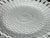 Wedgwood creamware pierced plate with basketweave molded center and scalloped openwork rim. English manufacture, impressed...