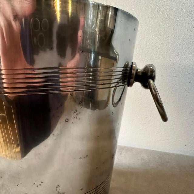 A silver plated champagne bucket designed and manufactured in France in the Fifties, it's in good conditions overall,...