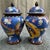 Description: A lovely small pair of Chinese Cloisonné Enamel "General Jars." One jar features a vibrant yellow dragon and...