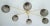 Italian asymmetrical flush mount with six smoky Murano glass globes mounted on lacquered polished brass frame / Made in...