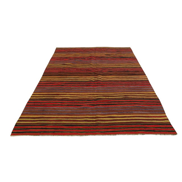 Handwoven vintage striped kilim rug from Denizli region of Turkey. Approximatelly 45-55 years old. In very good condition.
